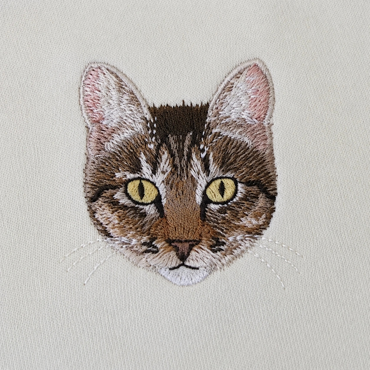 Tabby cat recreated in embroidery