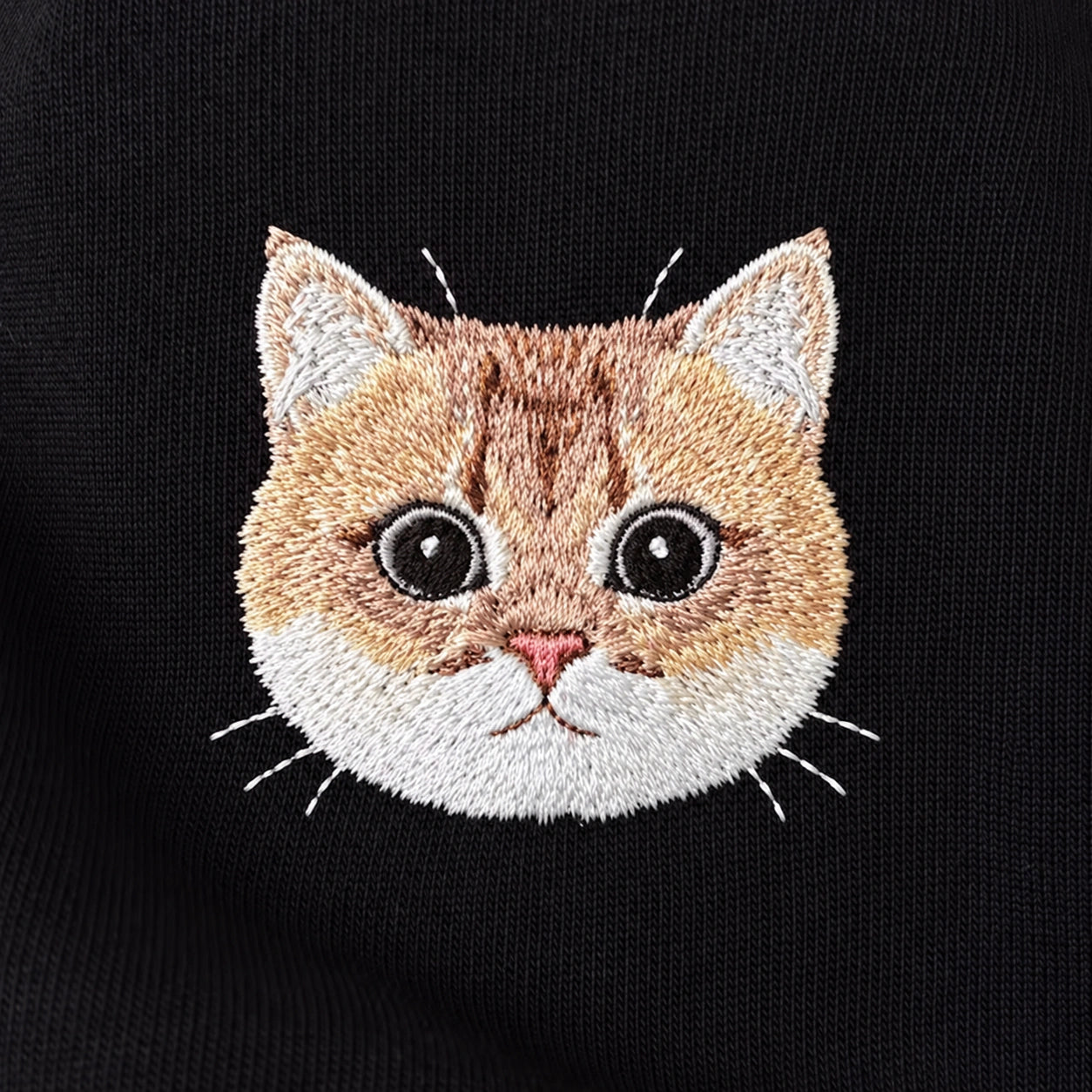 Golden cat recreated in embroidery