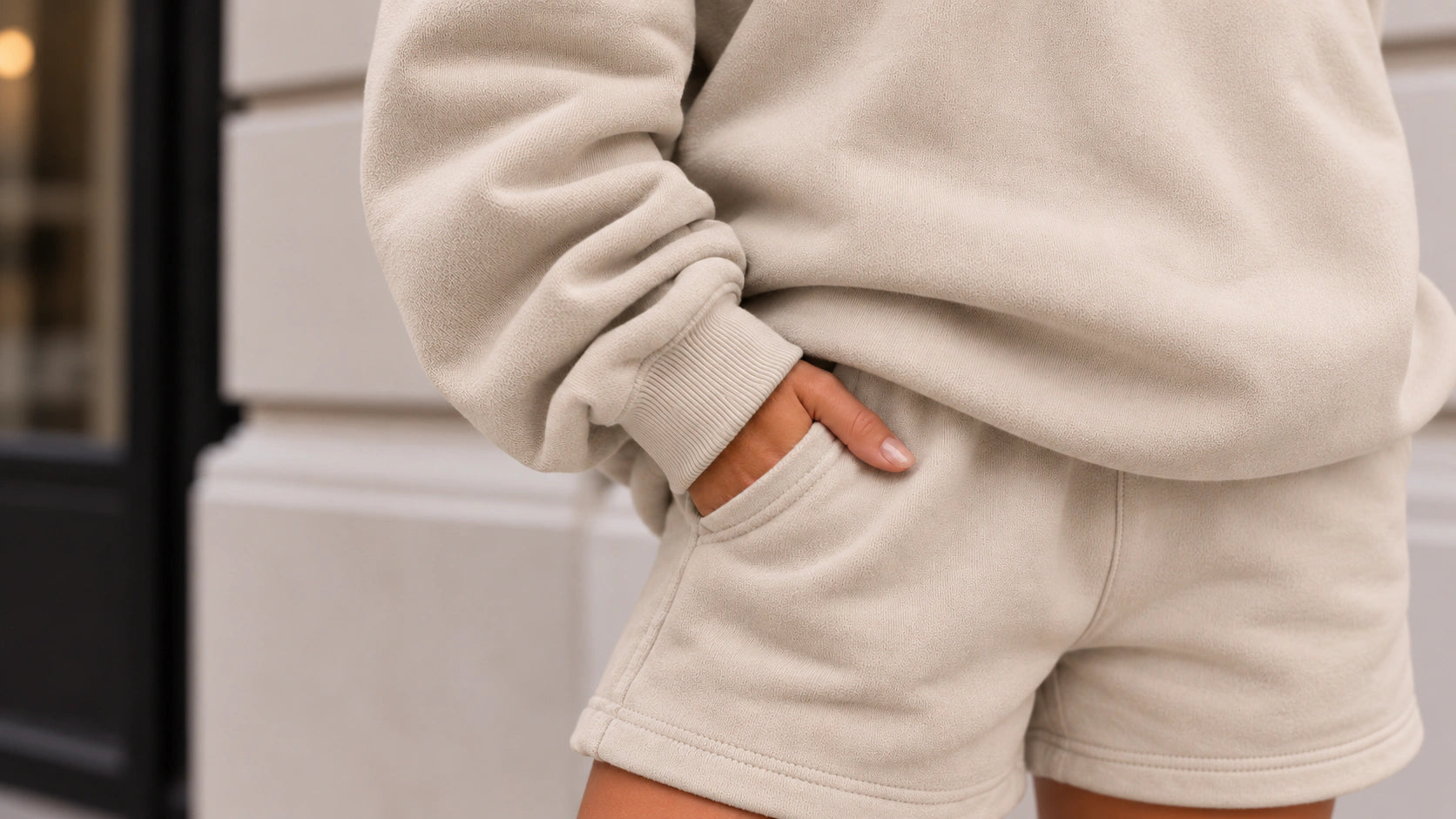 Close-up of the cream hoodie cuff where the NFC memory is scanned