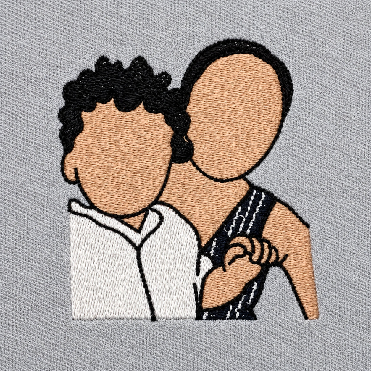 Mother and child recreated in embroidery
